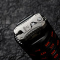 Compact Titanium Gravity‑Deploy Utility Cutter