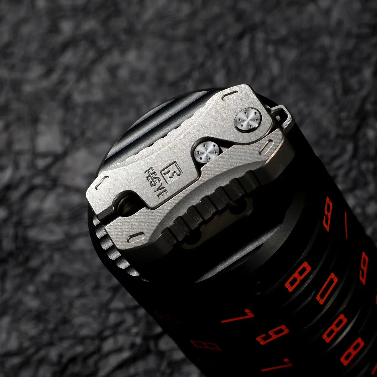Compact Titanium Gravity‑Deploy Utility Cutter