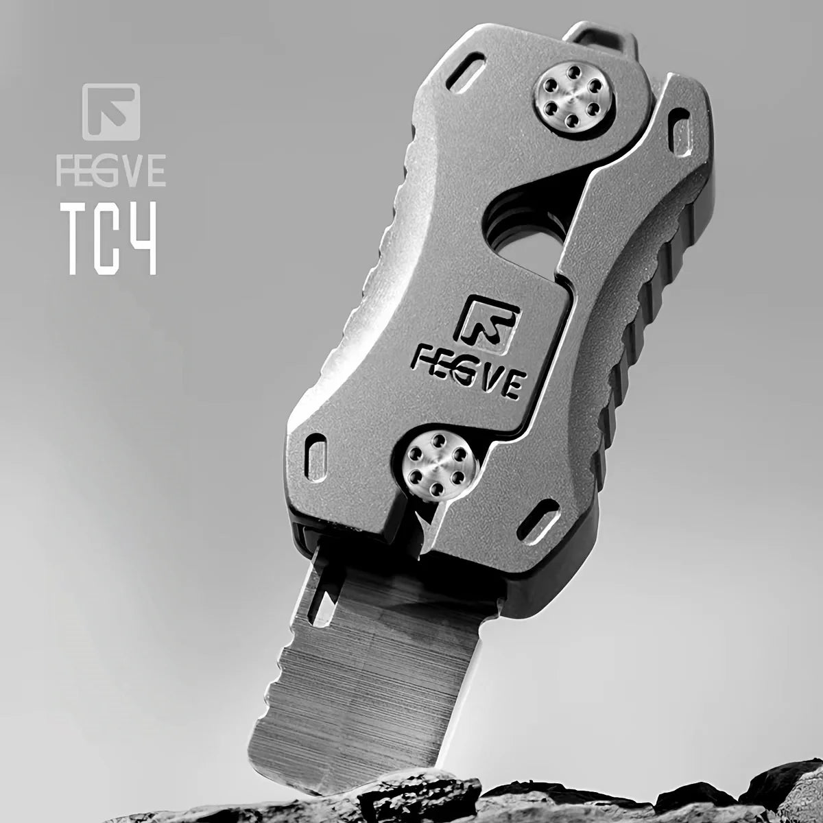 Compact Titanium Gravity‑Deploy Utility Cutter
